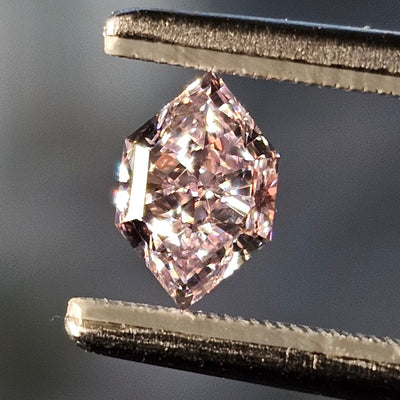 Purplish pink diamond, 0.74 carat, shield shape, VS2 clarity