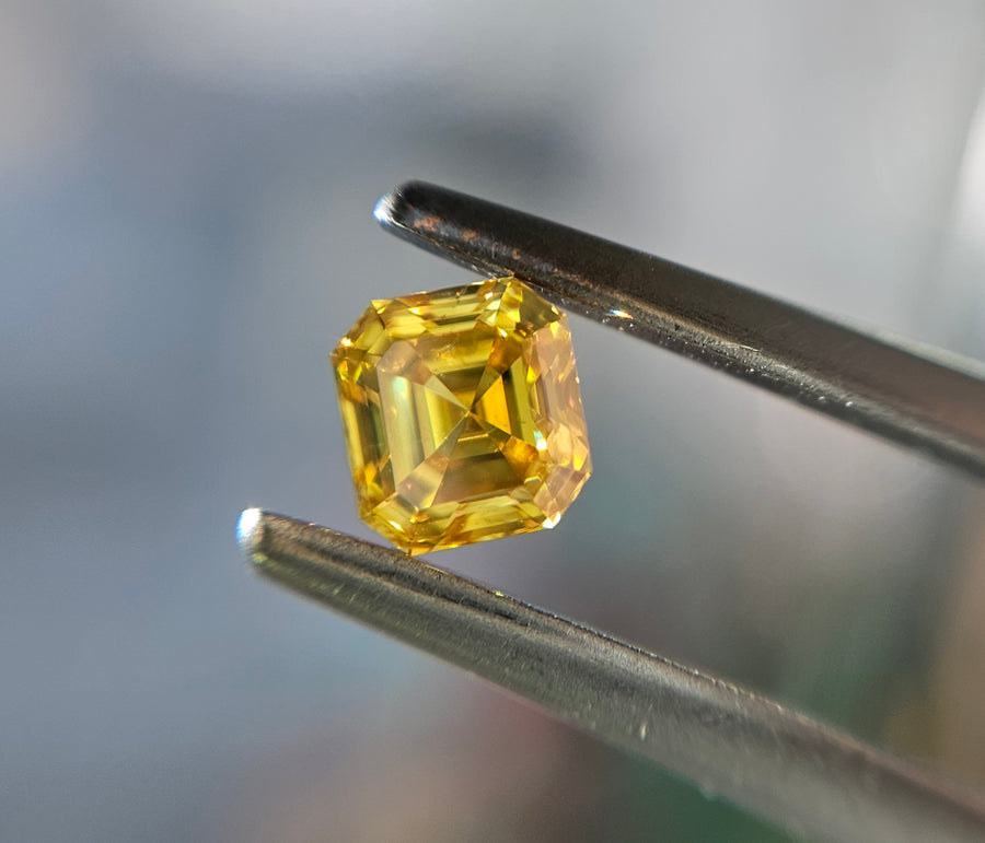 Yellow diamond, 0.47 carat, emerald shape, SI2 clarity