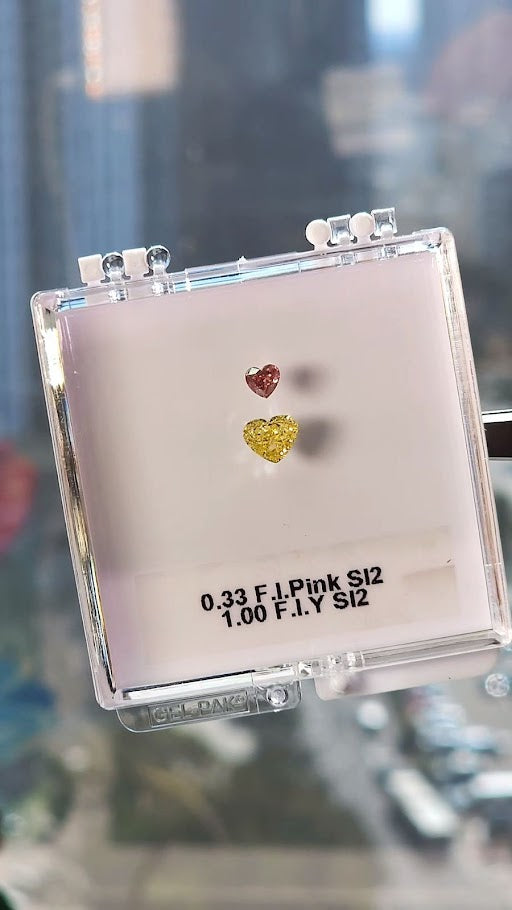 Pink & yellow diamonds, 1.33 total carat, heart shapes, SI2 clarity