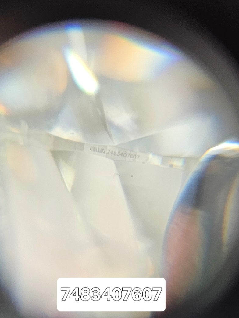 K color diamond, 0.96 carat, round shape, SI2 clarity