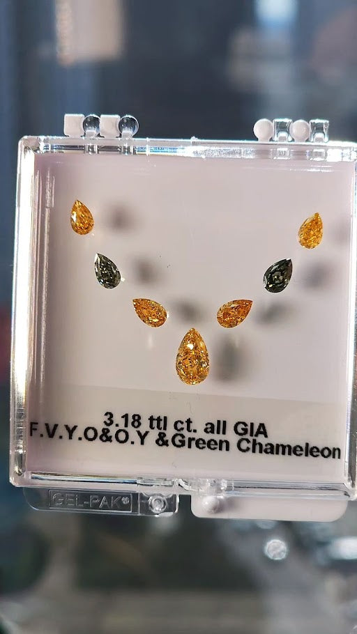Orange & green parcel, 3.18 total Carat, pear shapes, GIA certified