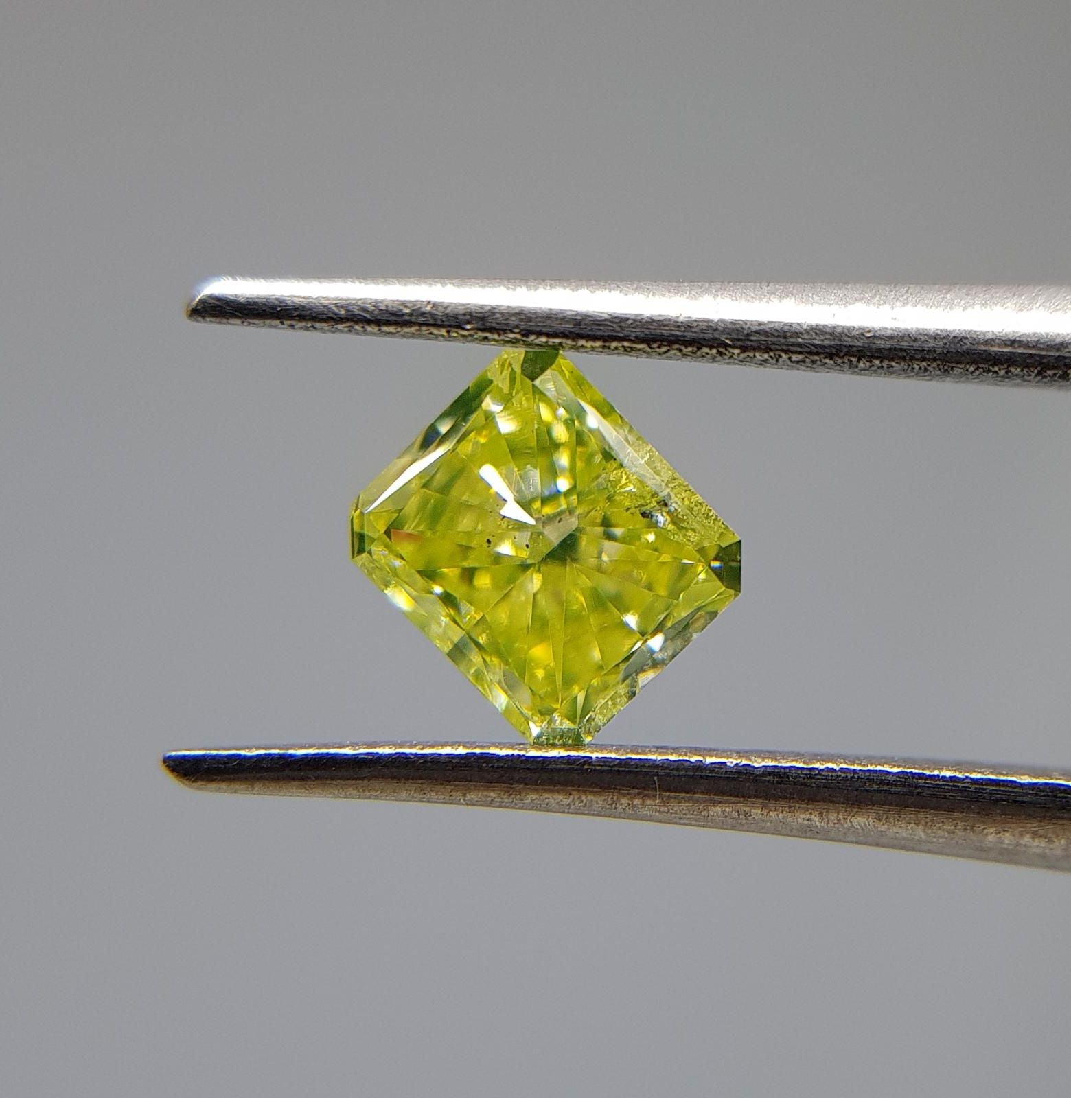 0.69 Carat RADIANT Shape YELLOW Color Diamond - VMK Diamonds