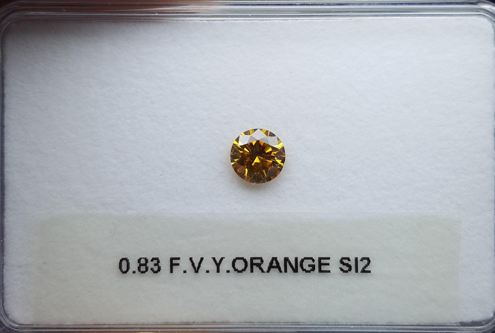 0.83 Carat ROUND Shape ORANGE Color Diamond - VMK Diamonds
