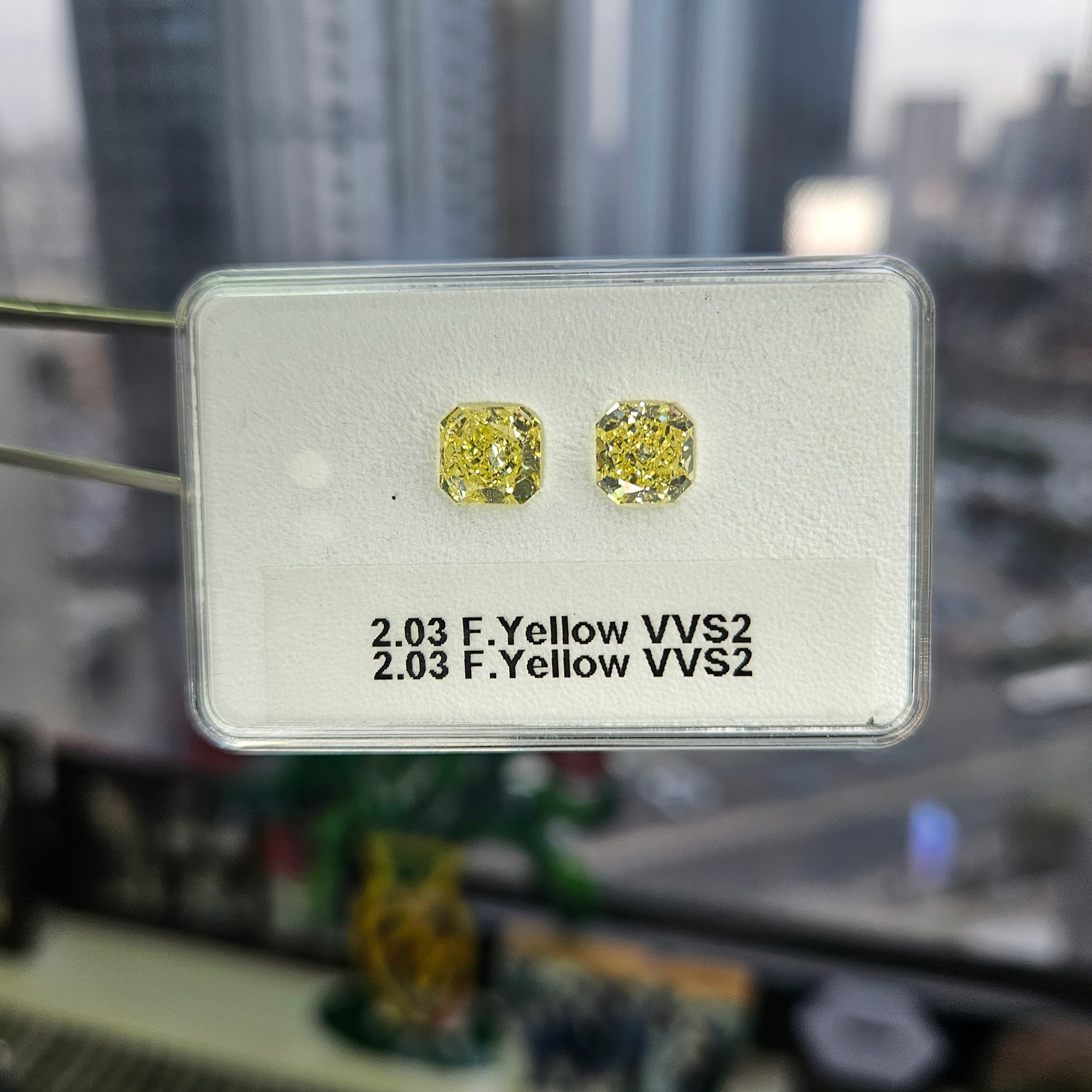 Yellow diamonds, 2.03 & 2.03 carats, radiant shape, both VVS2 clarity