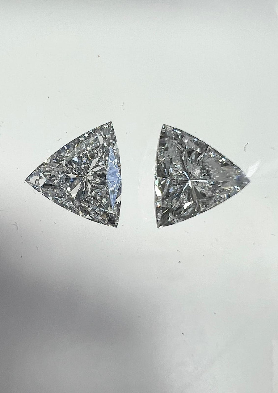 F color diamonds, 1.09 & 1.01 carats, trilliant shape, SI1 & i1 clarity