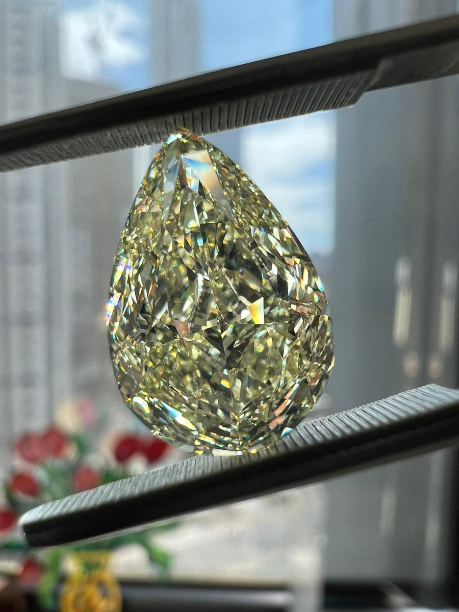 6.02 Carat PEAR Shape YELLOW Color Diamond