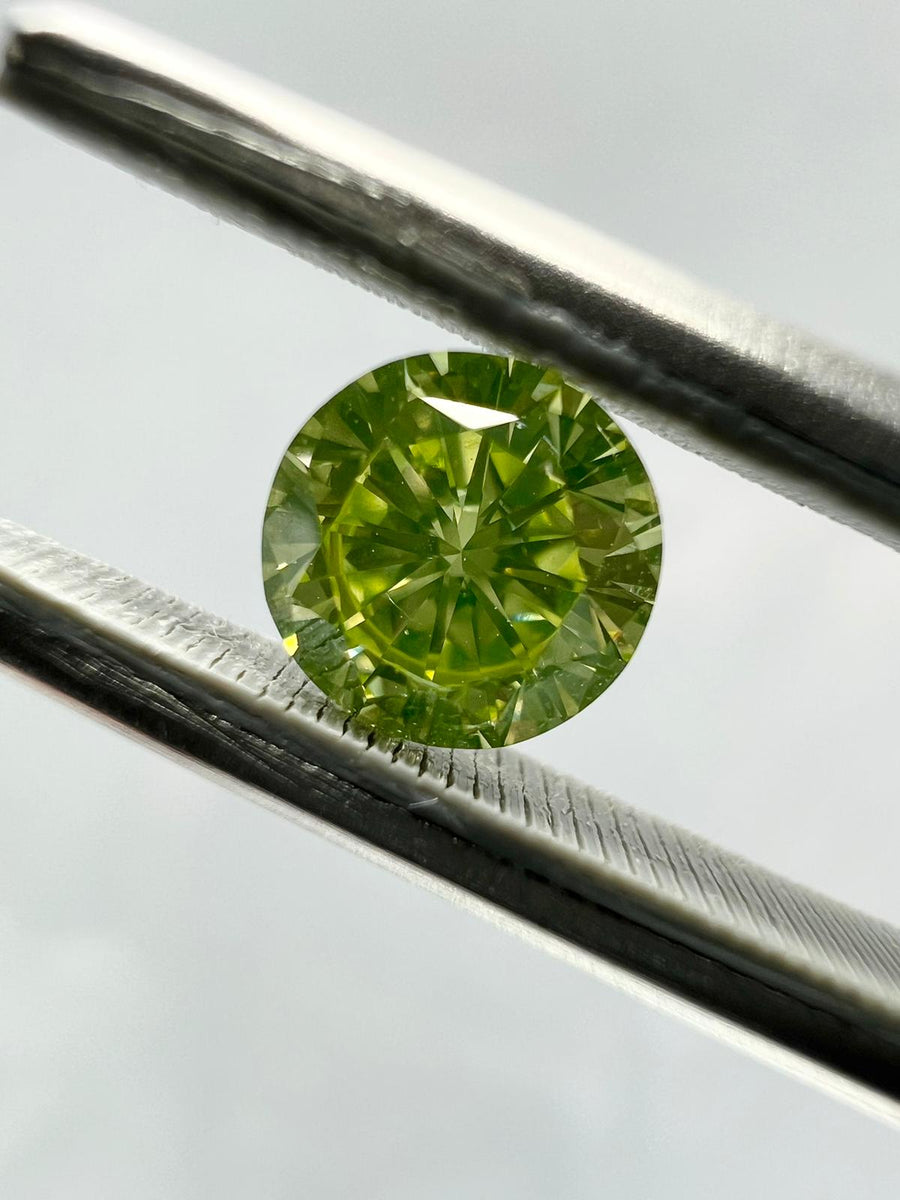 0.67 Carat ROUND Shape GREEN Color Diamond