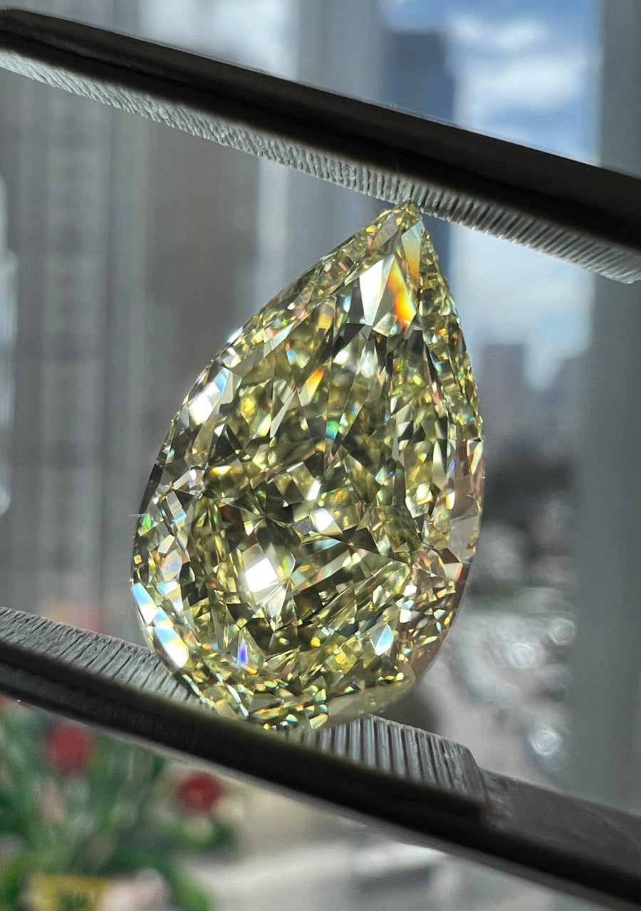 5.02 Carat PEAR Shape YELLOW Color Diamond