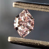 Purplish pink diamond, 0.74 carat, shield shape, VS2 clarity