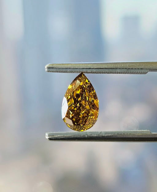 Halo intense orange-yellow diamond ring, 4.92 carat
