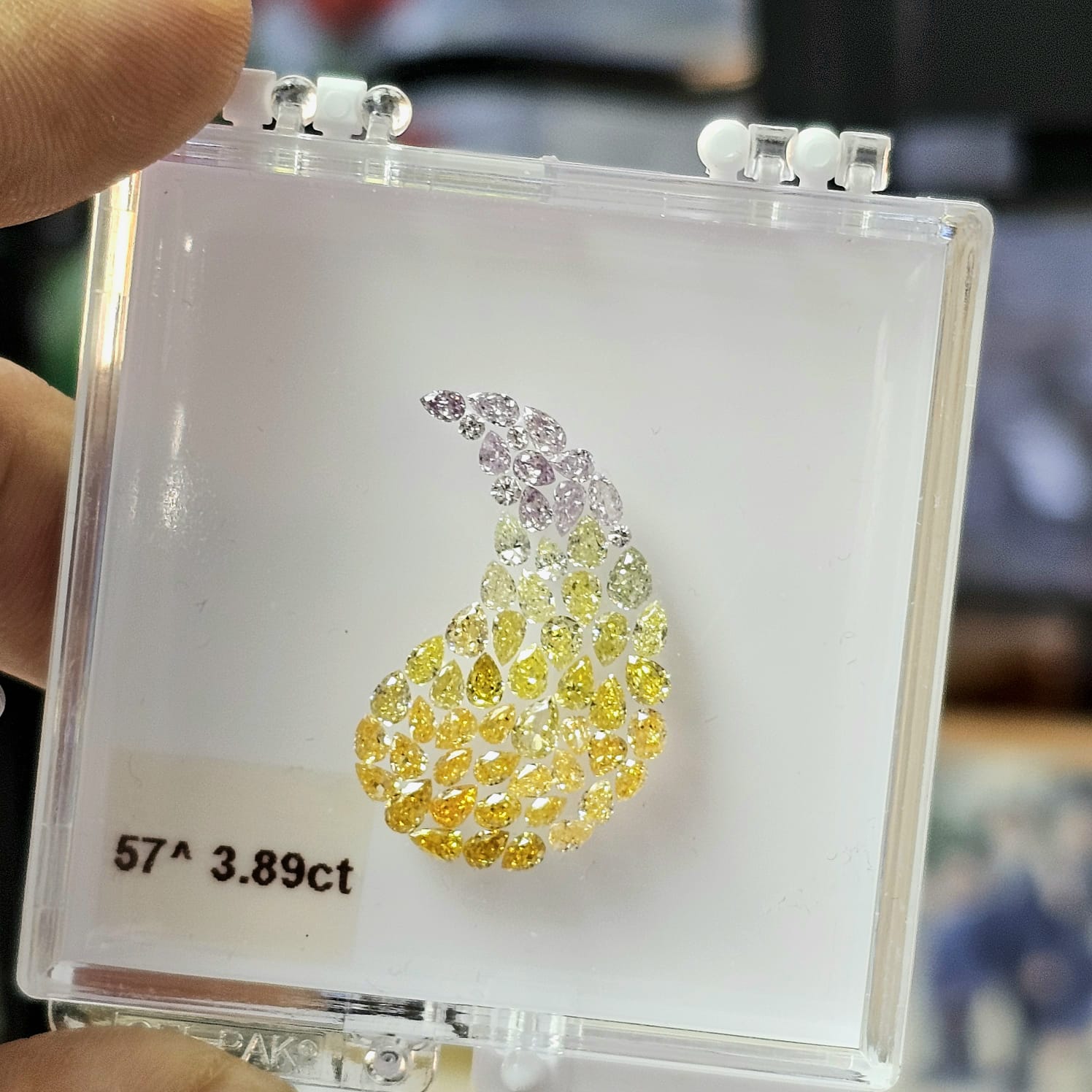 parcel of natural colored diamonds purple yellow and green