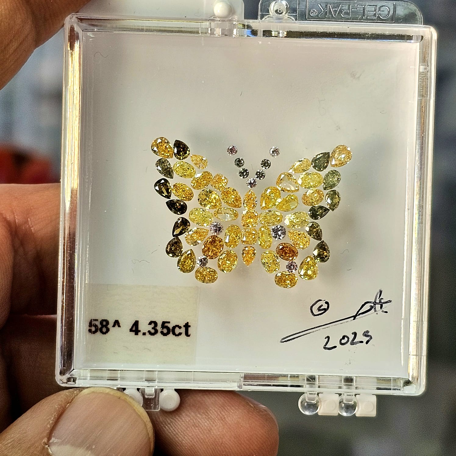 natural colored diamond layout parcel of natural colored diamonds yellow diamonds green diamonds pink diamonds