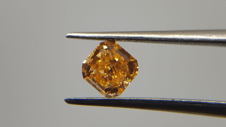 0.63 Carat RADIANT Shape ORANGE Color Diamond