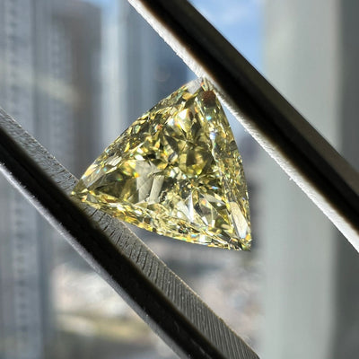 Yellow diamond, 1.05 carat, trilliant shape, SI2 clarity