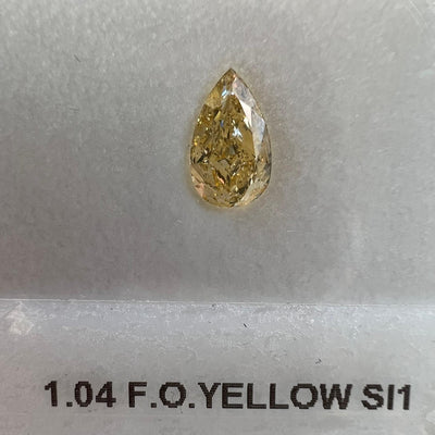 1.04 Carat PEAR Shape ORANGY YELLOW Color Diamond
