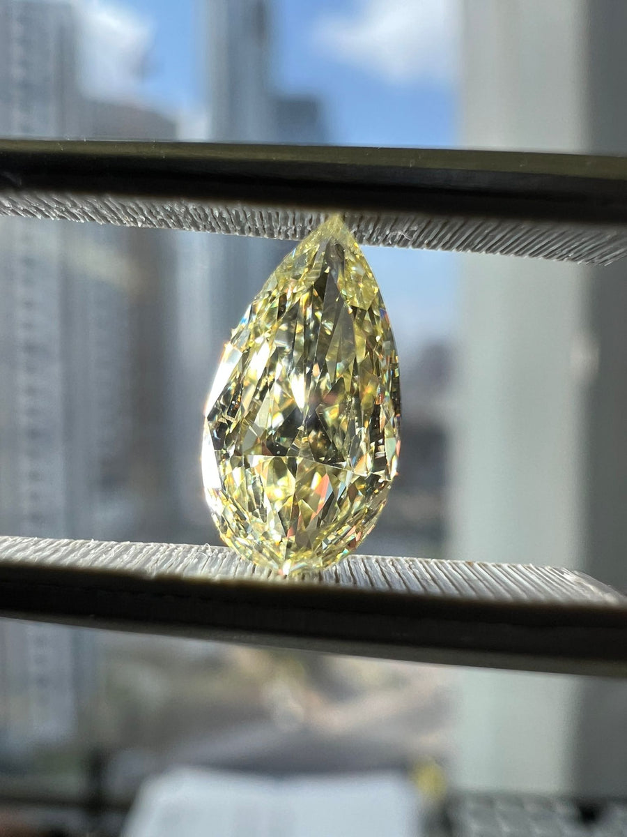 Light yellow diamond, 0.74 carat, pear shape, i1 clarity