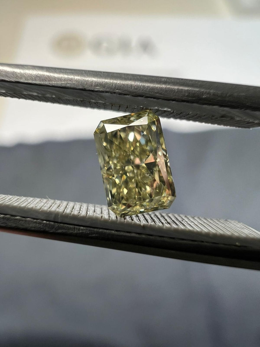 Light yellow diamond, 0.59 carat, radiant shape, SI1 clarity