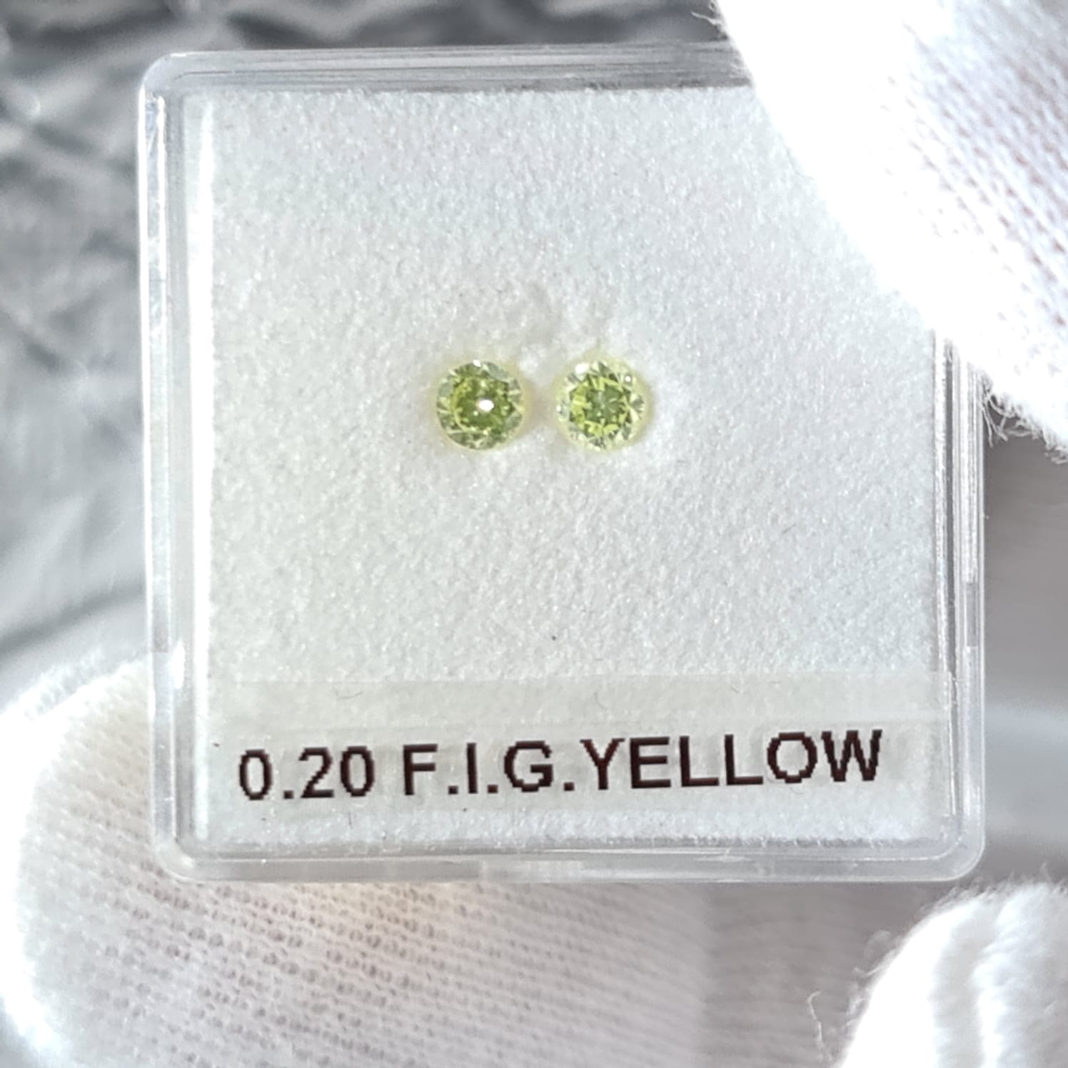 0.20 Carat ROUND Shape FIGY Color Diamond