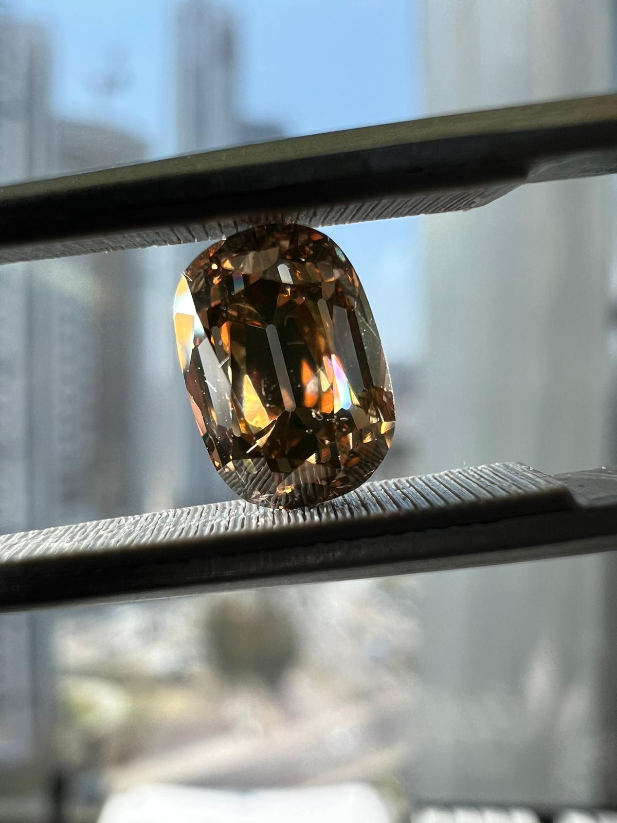 Orangy brown diamond, 1.51 carat, cushion shape, i1 clarity
