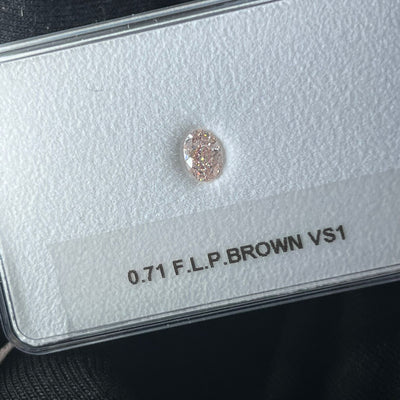 0.71 Carat OVAL Shape BROWN Color Diamond
