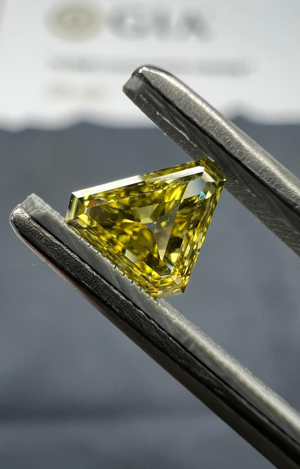 Yellow diamond, 0.33 carat, shield shape, VS2 clarity