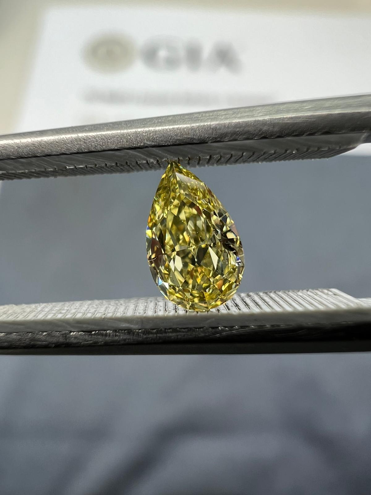 Yellow diamond, 0.25 carat, pear shape, VS1 clarity
