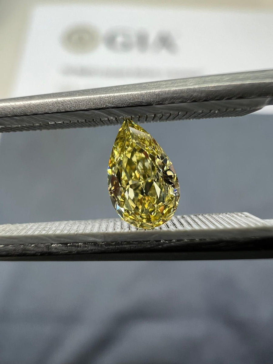 Yellow diamond, 0.25 carat, pear shape, VS1 clarity