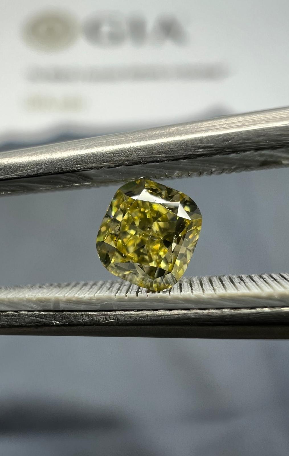 Yellow diamond, 0.31 carat, cushion shape, SI1 clarity