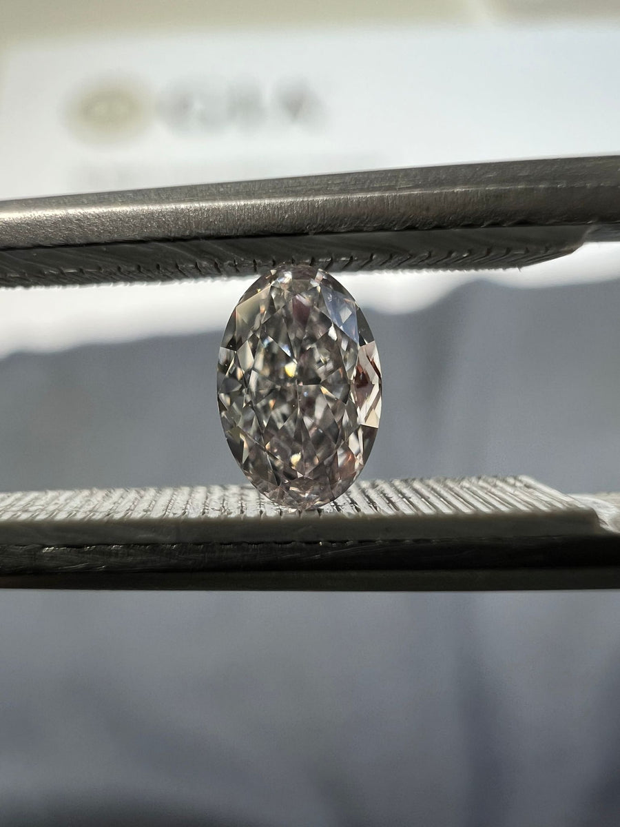 Pink diamond, 0.32 carat, oval shape, VS2 clarity