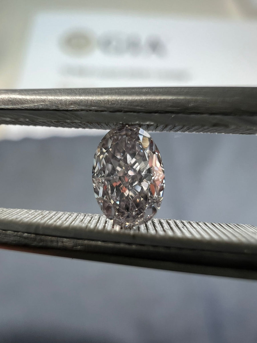 Pink diamond, 0.35 carat, oval shape, VS2 clarity