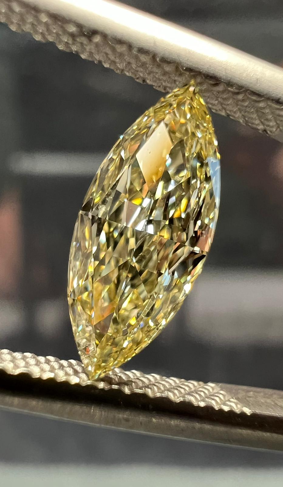 Yellow diamond, 0.80 carat, marquise shape, VS2 clarity
