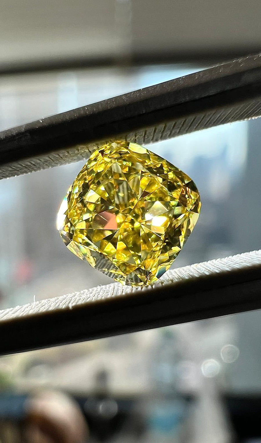 0.72 Carat CUSHION Shape YELLOW Color Diamond