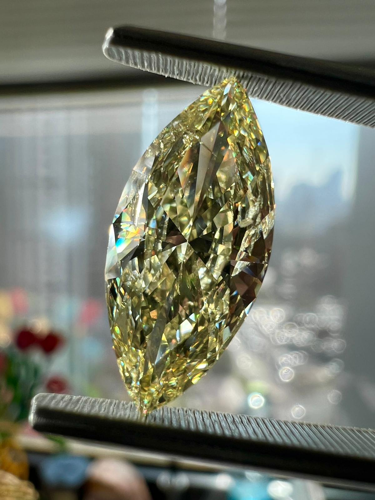 Yellow diamond, 3.50 carat, marquise shape, i1 clarity