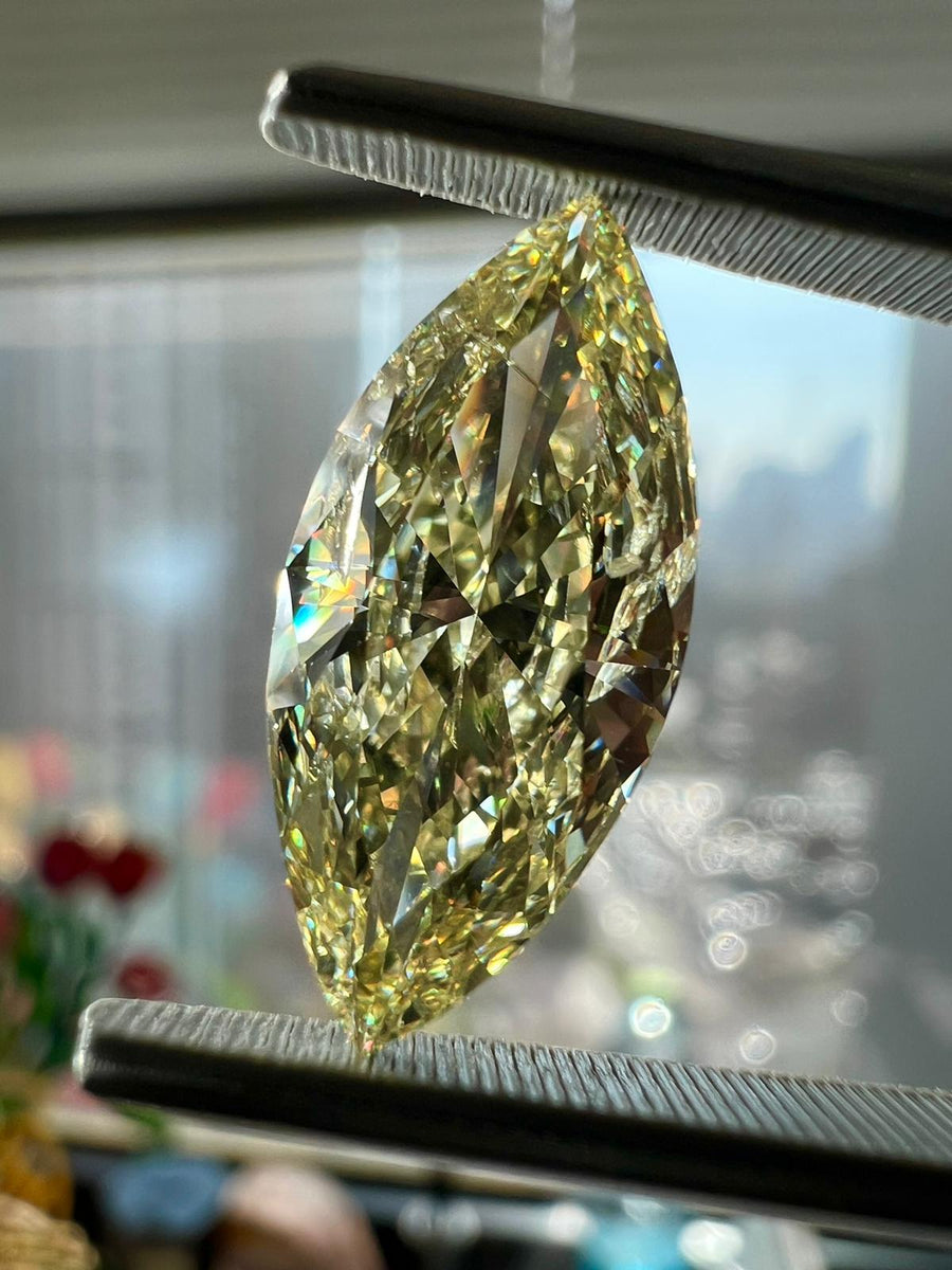 Yellow diamond, 3.50 carat, marquise shape, i1 clarity