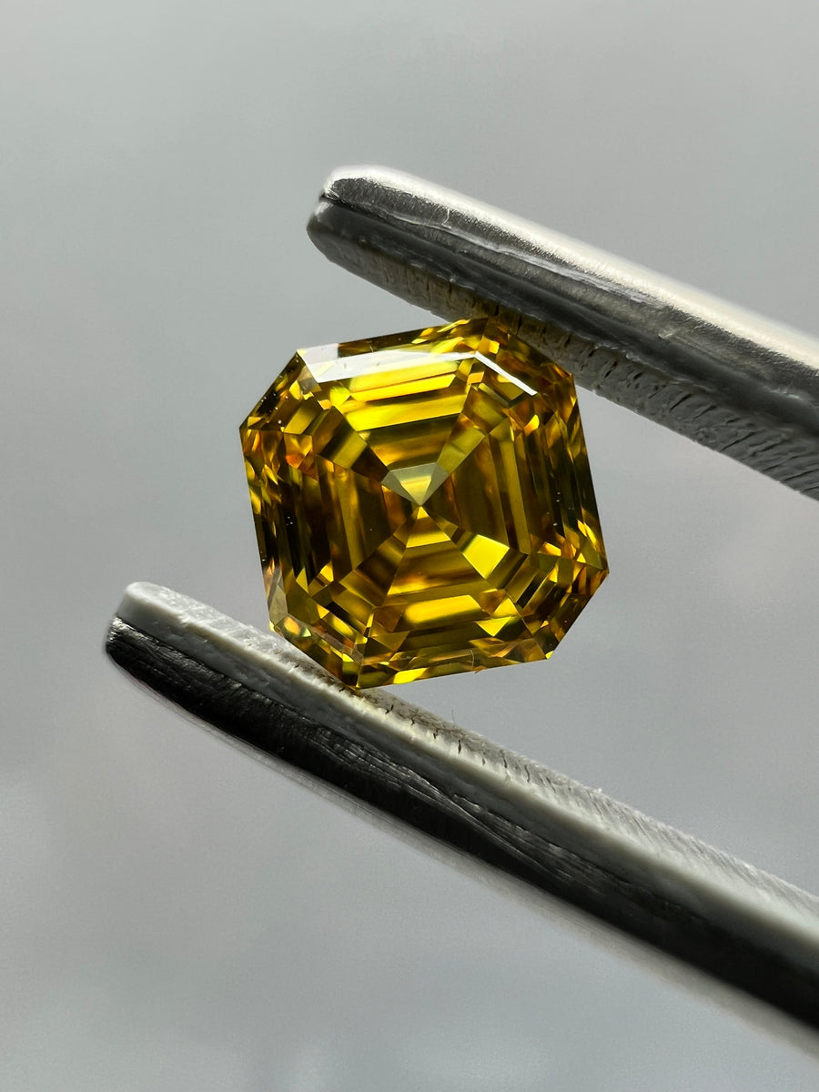 1.02 Carat ASSCHER Shape ORANGY YELLOW Color Diamond