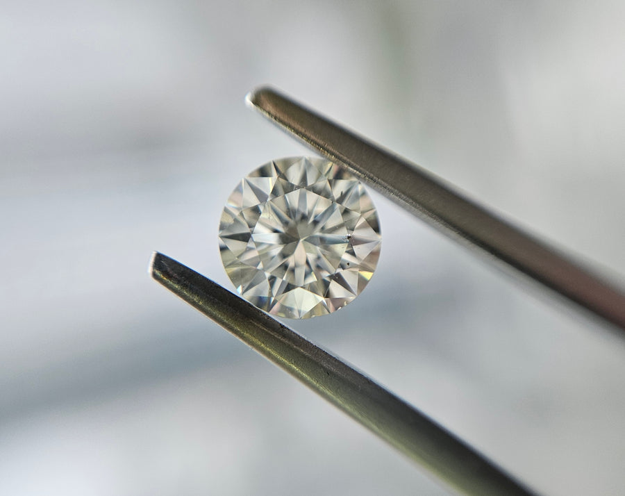 clean looking round diamond natural low color clarity good value for money