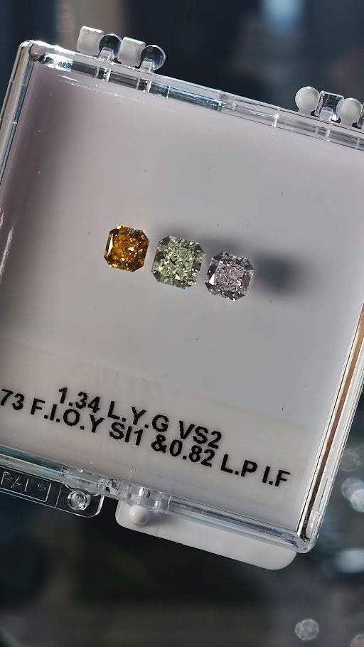 parcel of natural colored diamonds, green diamond, orange diamond, pink diamond, GIA certified