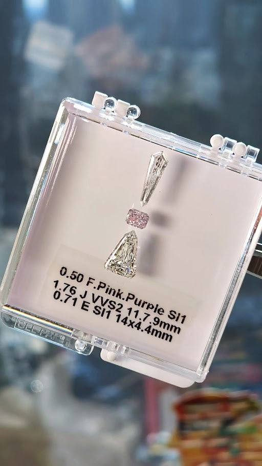 Collection of purple pink & colorless diamonds, 2.97ct. GIA certified