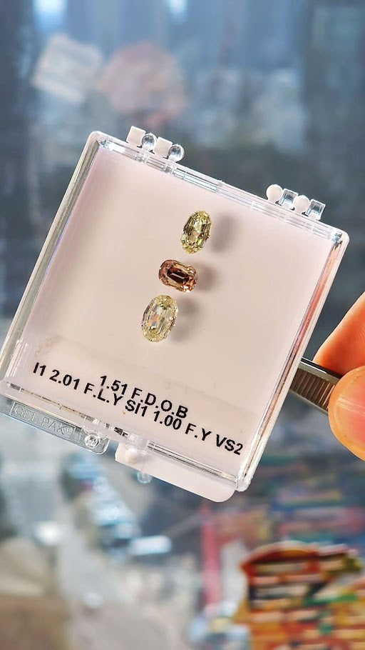 Collection of yellow and orangy diamonds, 4.52 ct., GIA certified, VS2-I1 clarity