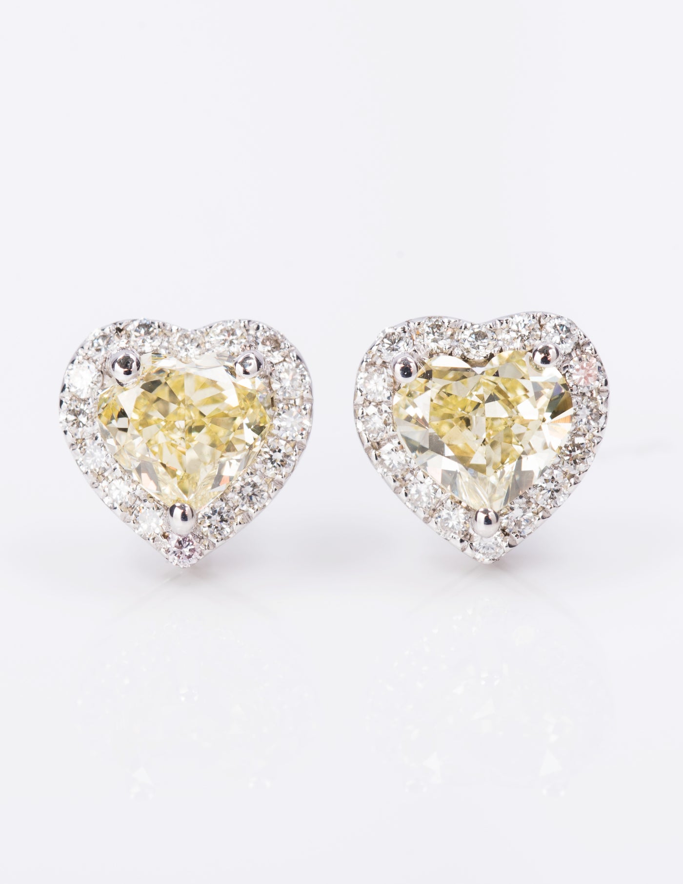 Heart shaped yellow diamond earring, 1.94 carat