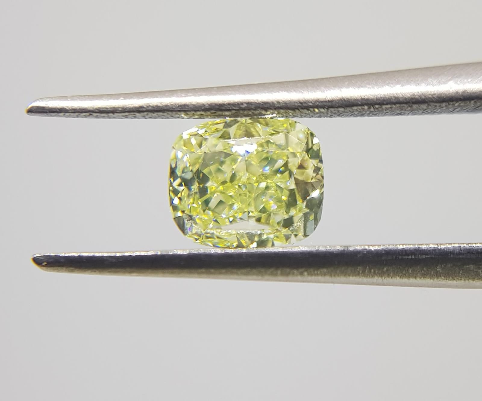 0.91 Carat CUSHION Shape YELLOW Color Diamond - VMK Diamonds