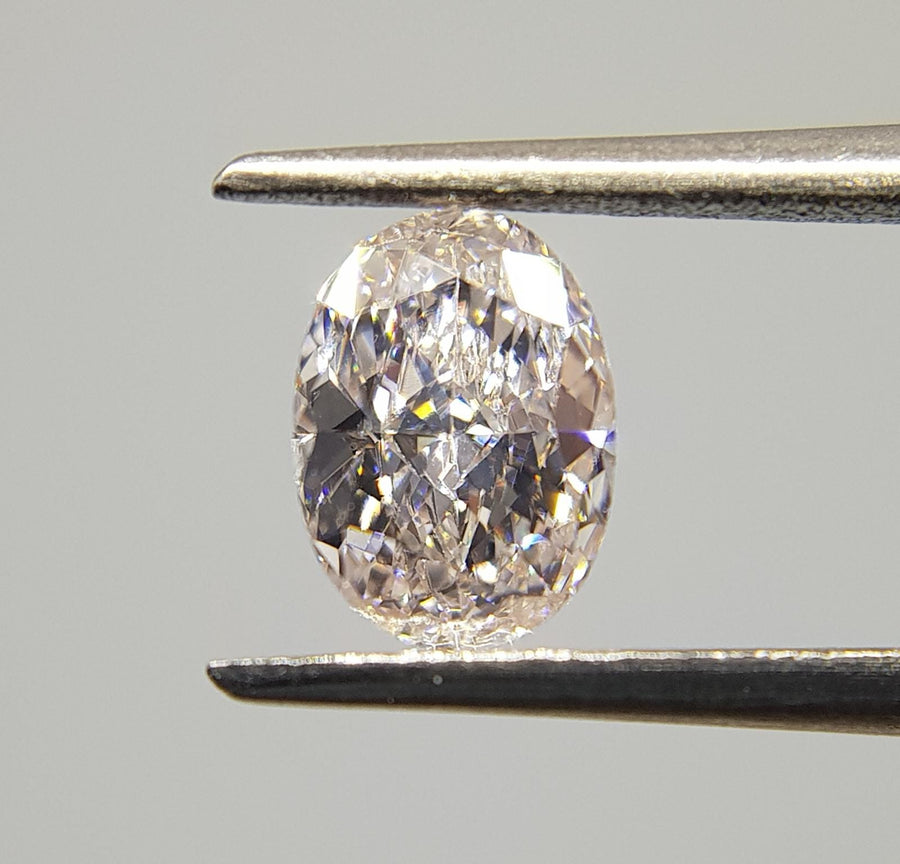 0.56 Carat OVAL Shape PINK Color Diamond - VMK Diamonds