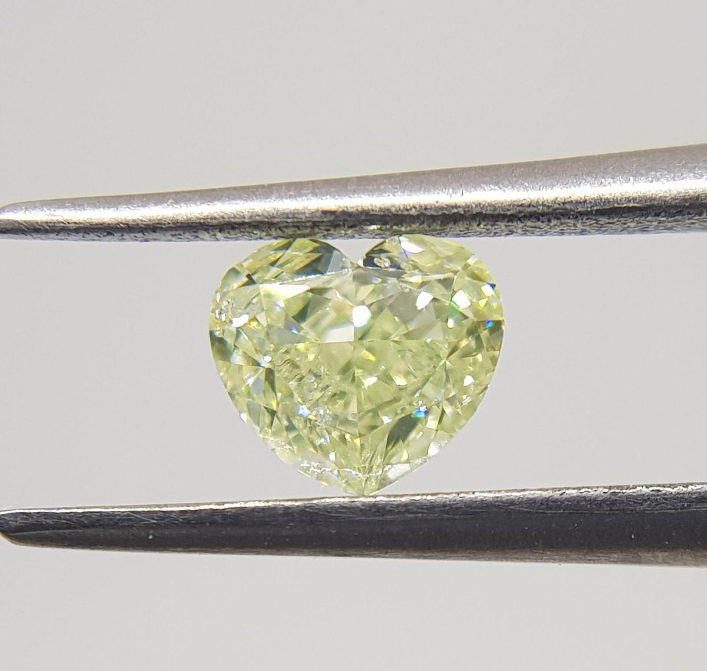 0.57 Carat HEART Shape YELLOW Color Diamond