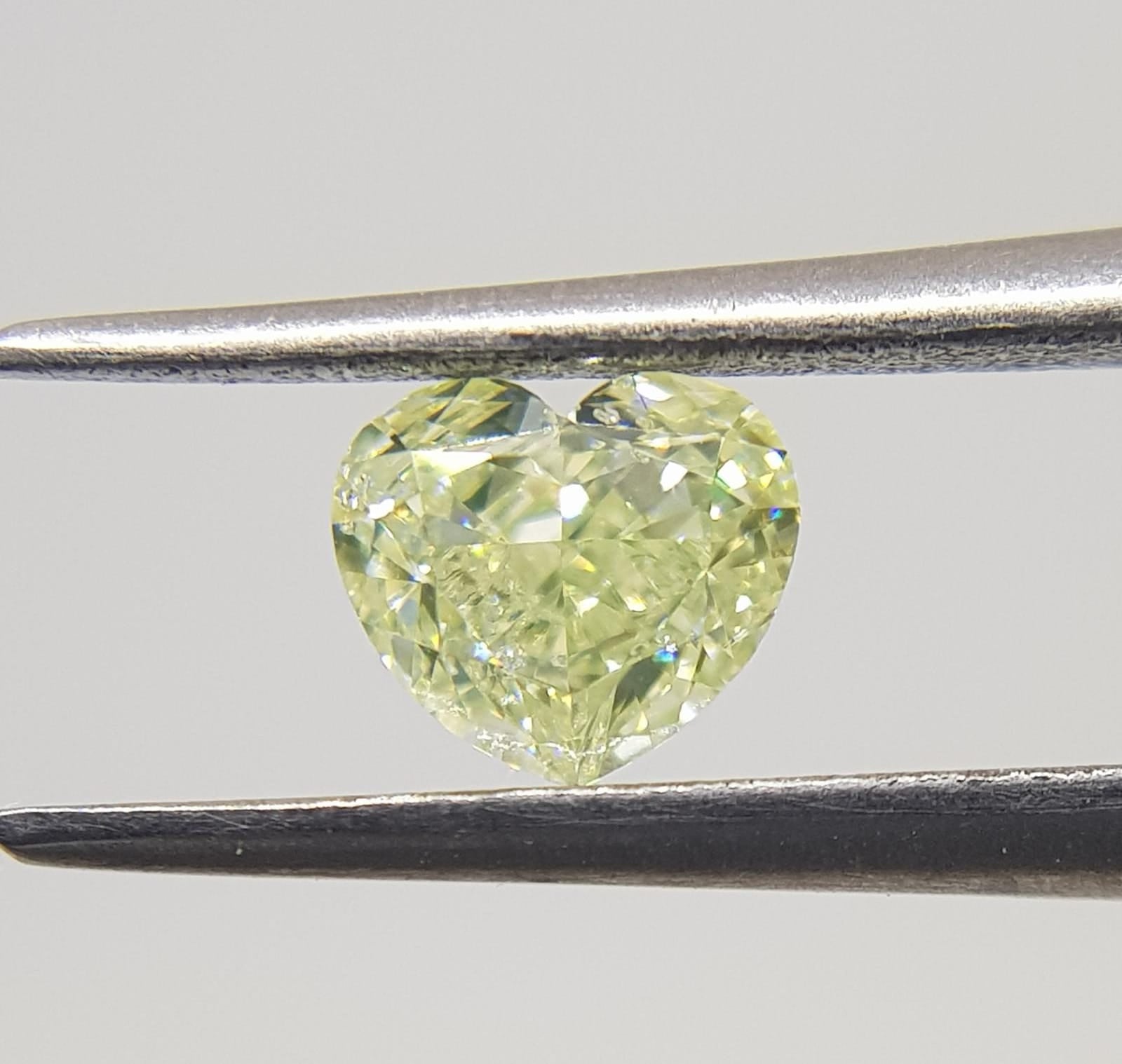 0.57 Carat HEART Shape YELLOW Color Diamond
