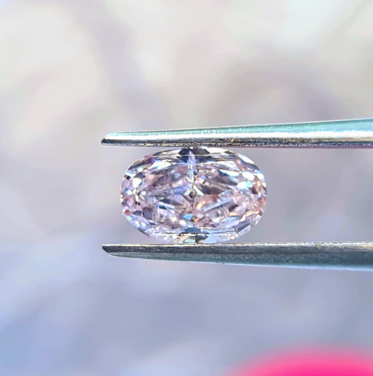 0.89 Carat OVAL Shape PINK Color Diamond