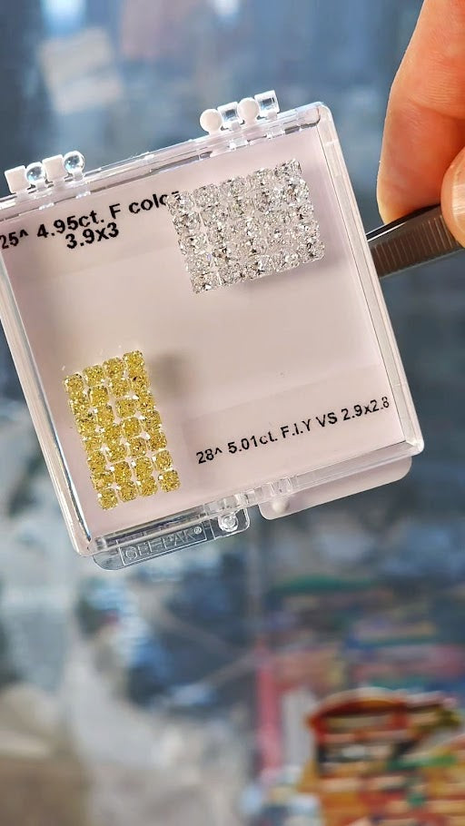 Collection of intense yellow and colorless diamonds, 53pcs in total, 9.96 total carat