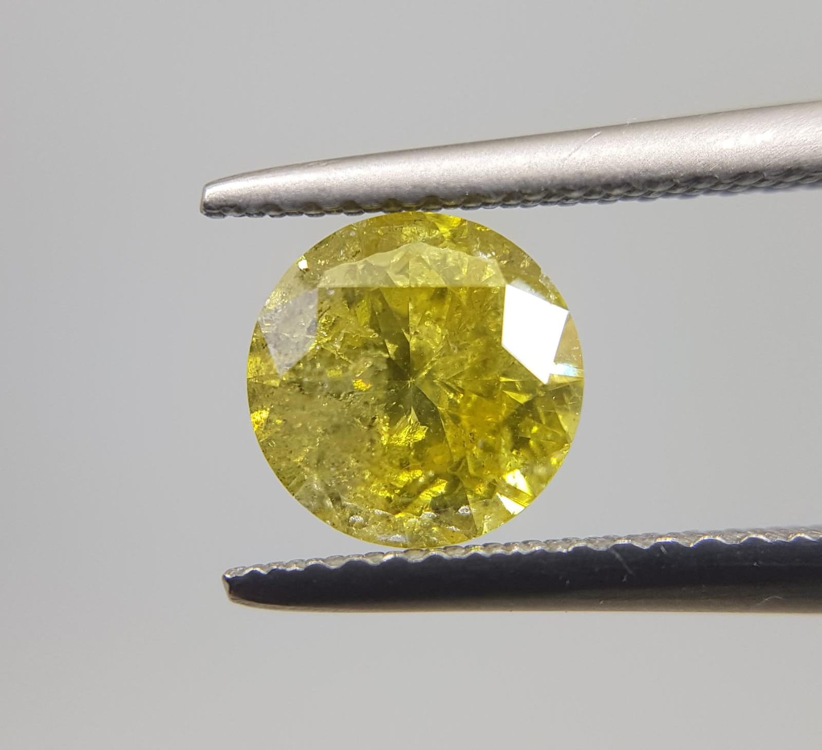1.52 Carat ROUND Shape YELLOW Color Diamond - VMK Diamonds